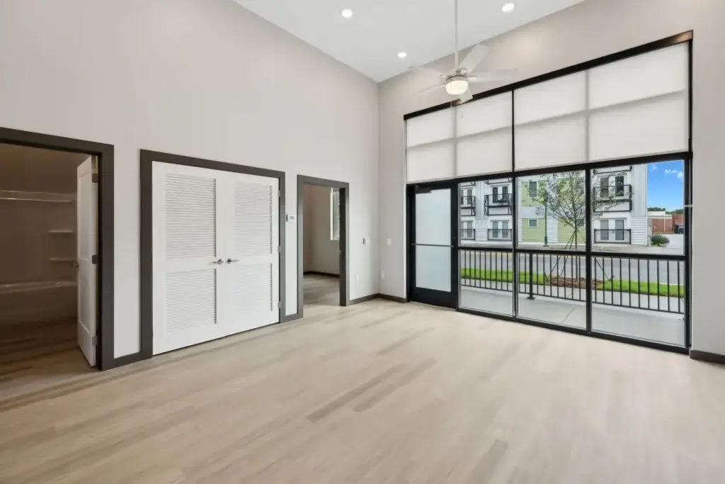 Interior 1st floor living space with view of exterior patio and main street